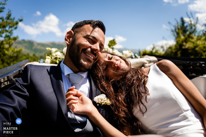 Photo by: <a href="https://www.wpja.com/contests/2019-v17/best-wedding-photographers/2564623">Lisa Pacor - Trieste Trieste</a> Abruzzo, Pettorano Sul Gizio - photographer rides in convertible car with the bride and groom