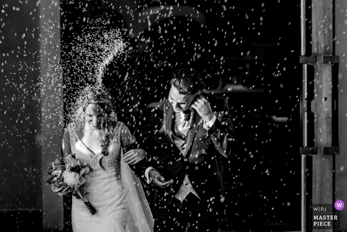 Photo by: <a href="https://www.wpja.com/contests/2019-v17/best-wedding-photographers/2564908">Sergio Cueto - Alcala de Henares Madrid</a> Iglesia de Las Rozas wedding photography showing Rice throwing