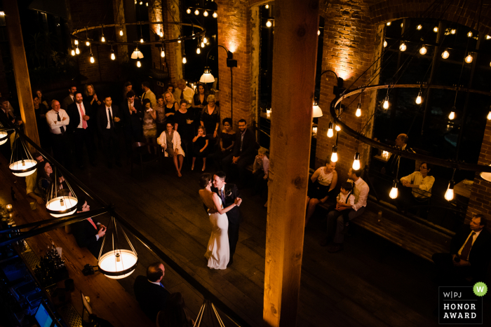 Waterworks Restaurant - Winooski, VT wedding venue photo: The bride and groom have their first dance 