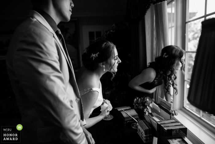 Private residence wedding photography at Saratoga | One last peek out the window