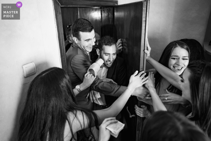 Photo by: <a href="https://www.wpja.com/contests/2019-v18/best-wedding-photographers/2566340">Todor Rusinov - Sofia Sofia</a> Bulgaria Home gate crashing groomsmen photography - Where is the bride?
