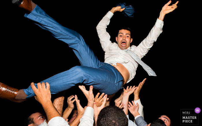 Photo by: <a href="https://www.wpja.com/contests/2019-v18/best-wedding-photographers/2566781">Monica Guimaraes - Maceió Alagoas</a> Brazil Wedding Reception groom flying! Pictures from after the wedding.