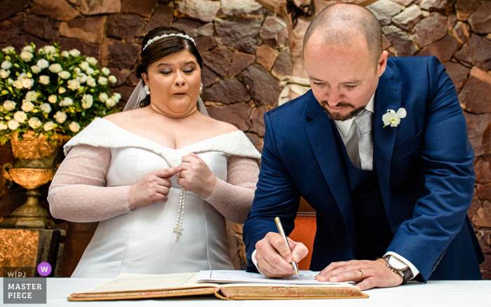 Photo by: <a href="https://www.wpja.com/contests/2019-v18/best-wedding-photographers/2566801">Monica Guimaraes - Maceió Alagoas</a> Brazil ceremony signing of the certificate photo | Wow!! We got married!