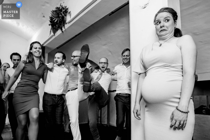 Photo by: <a href="https://www.wpja.com/contests/2019-v18/best-wedding-photographers/2566895">Freek Nagtzaam - 's-Hertogenbosch Noord Brabant</a> Kasteel Heeswijk line dancing reception party photography after the wedding.