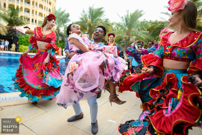 Photo by: <a href="https://www.wpja.com/contests/2019-v18/best-wedding-photographers/2566984">Ankita Asthana - Mumbai Maharashtra</a> Wedding celebration photography at Ras Al Khaimah, UAE - The groom loved lifting up his mother as a growing boy and now when he is getting married, his favourite thing to do is to lift his bride up and dance with her!