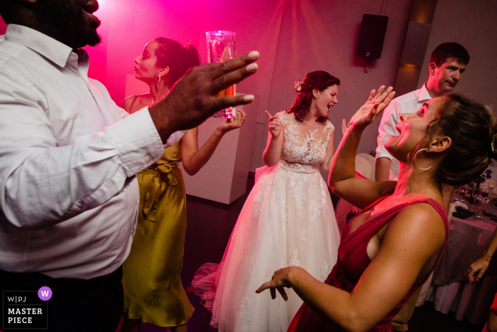 Photo by: <a href="https://www.wpja.com/contests/2019-v18/best-wedding-photographers/2567024">Sanne De Block - Wijnegem Antwerpen</a> Wavre wedding photo of the bride and her guests on the dance floor.