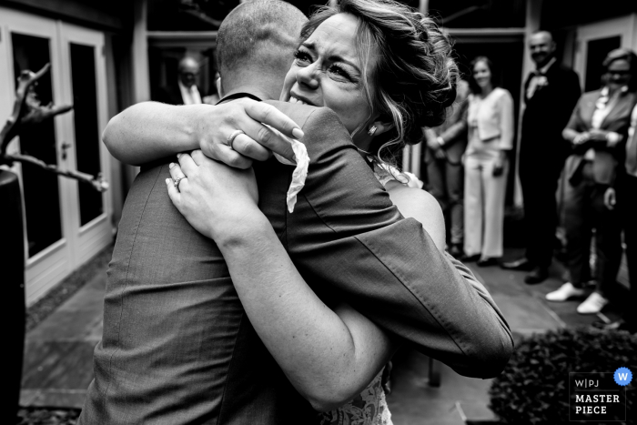 Photo by: <a href="https://www.wpja.com/contests/2019-v18/best-wedding-photographers/2567261">Linda Bouritius - Amersfoort Utrecht</a> Kasteel van Maurick, the Netherlands wedding photographer: The first look of the bride and groom. In the backyard of her parents. Surrounded by their loved ones.