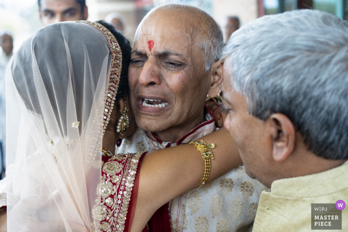 Embassy Suites St Charles Missouri Wedding Photographer: Dad Giving away bride and sharing tears