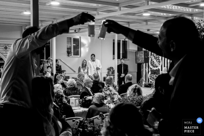 Özak Hotel, Ayvalık, Balıkesir	wedding photography - Best men are toasting their drinks when the couple are making their speeches.