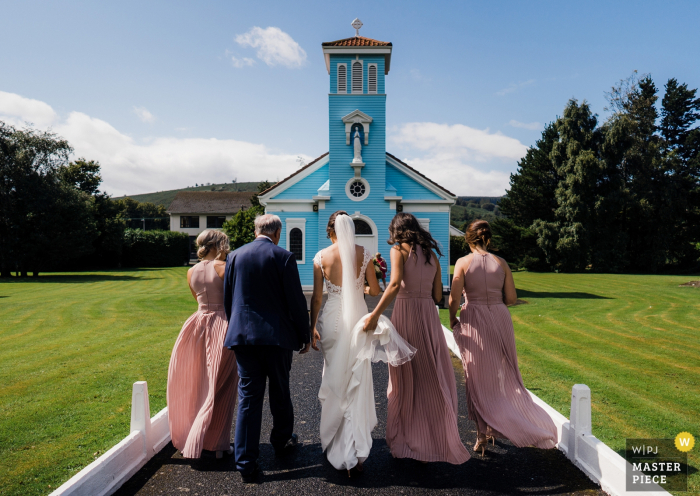 Photo by: <a href="https://www.wpja.com/contests/2019-v18/best-wedding-photographers/2567718">Roger Kenny - Greystones Wicklow</a> Wedding photos from the Little Blue Church Co Dublin Ireland - Bridal party arrive to the church.