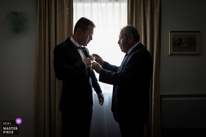 Photo by: <a href="https://www.wpja.com/contests/2019-v18/best-wedding-photographers/2567723">Marck Yvan - Strasbourg </a> Alsace wedding ceremony preparation at hotel | Picture of the Father & Son together