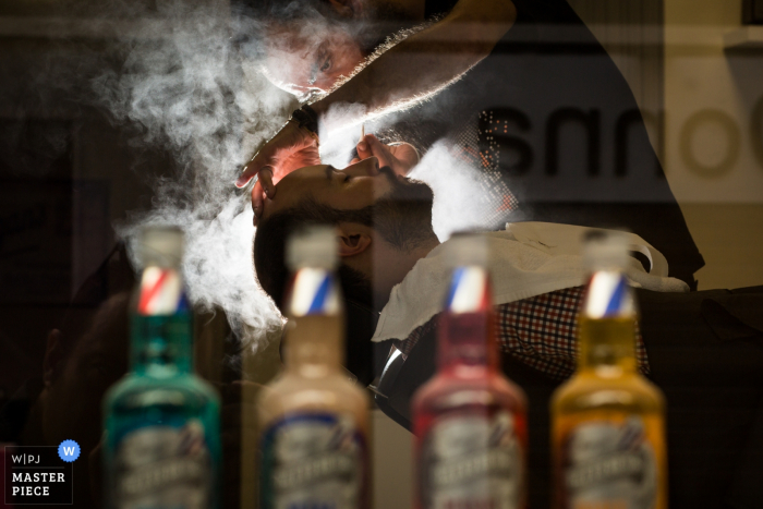 Spain Getting ready picture of the Groom at barber with water vapor