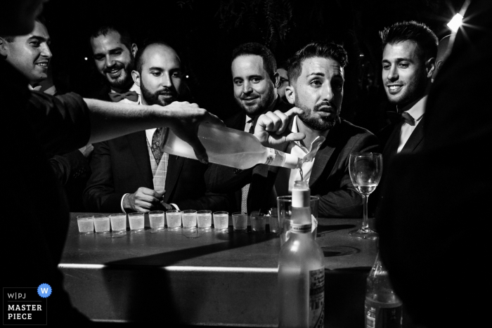 Photo by: <a href="https://www.wpja.com/contests/2019-v18/best-wedding-photographers/2567788">Miguel Onieva - Madrid Madrid</a> Spain Wedding Venue Picture of the groom and his friends with shots