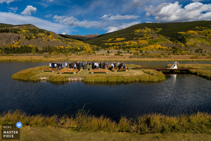 Photo by: <a href="https://www.wpja.com/contests/2019-v18/best-wedding-photographers/2567918">Brenda Bergreen - Evergreen Colorado</a> Camp Hale CO Bride and groom exiting ceremony - Outdoor wedding photography in nature