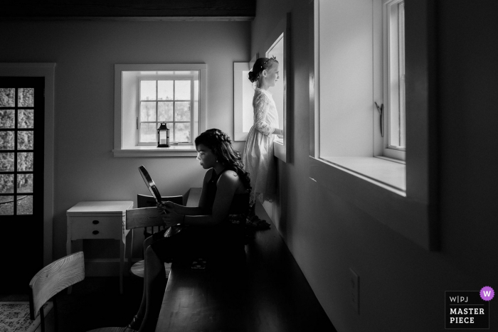 Photo by: <a href="https://www.wpja.com/contests/2019-v18/best-wedding-photographers/2568010">Colleen Stepanian - Philadelphia Pennsylvania</a> Wedding Venue Photos: Durham Hill Farm, Pipersville, Pennsylvania - Flower girl and bridesmaid patiently waiting and watching guests arrive before the start of the ceremony.