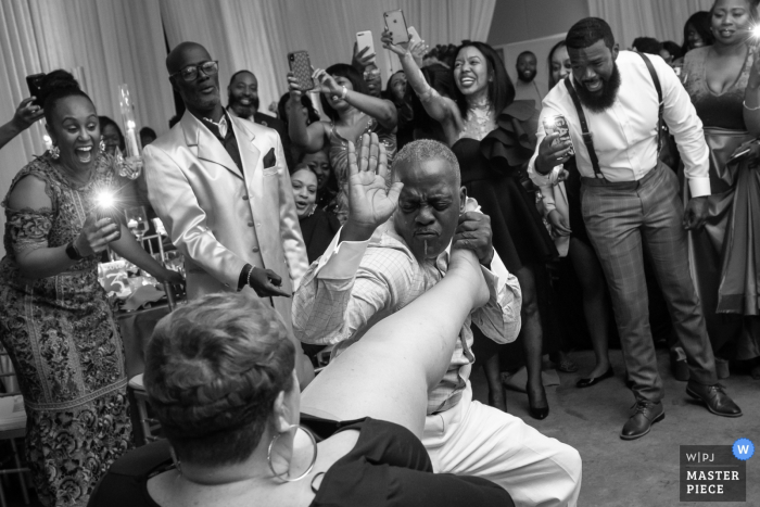 Photo by: <a href="https://www.wpja.com/contests/2019-v18/best-wedding-photographers/2568201">Kenneth Clapp - Baltimore Maryland</a> Maryland wedding reception in Baltimore - Action photography from the dance floor: come here girl
