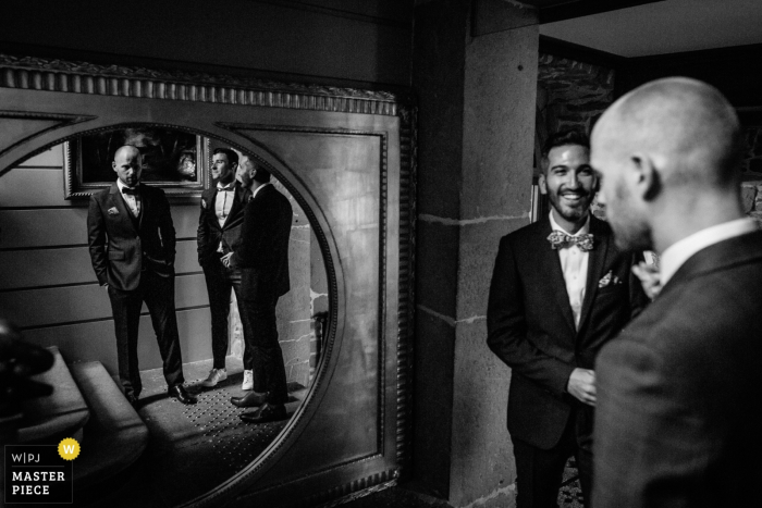groom getting ready photography in the mirrors in black and white chateau de servolex groom getting ready photography in the mirrors in black and white.