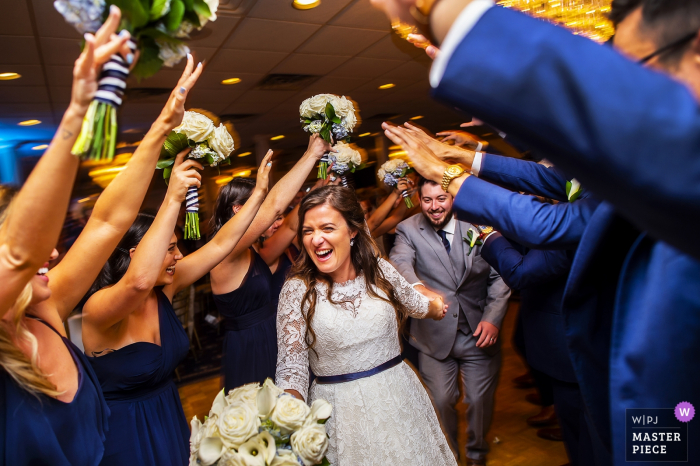 Photo by: <a href="https://www.wpja.com/contests/2019-v19/best-wedding-photographers/2569134">Eric Sucar - Ocean Grove New Jersey</a> NJ wedding photography at The Breakers on the Ocean - The bride and groom arrive on the dance floor during the start of their reception.