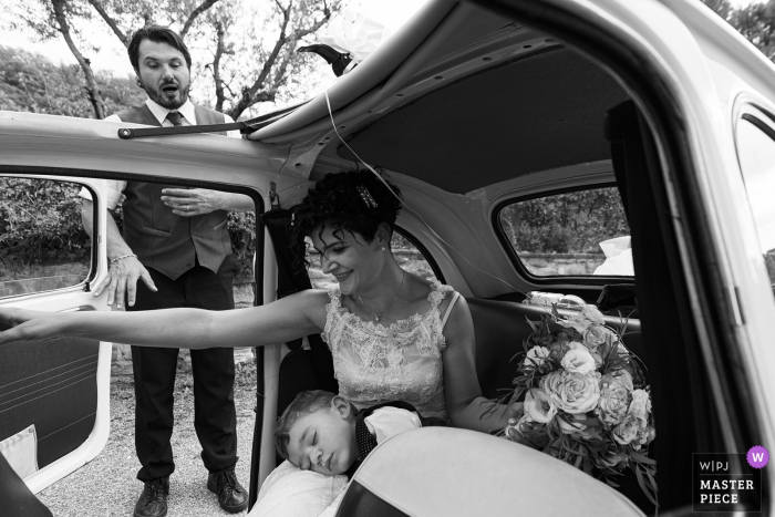 Photo by: <a href="https://www.wpja.com/contests/2019-v19/best-wedding-photographers/2570153">Simone Bacci - Arezzo Arezzo</a> The maitre was surprised by seeing bride's son sleeping inside the car at an Arezzo wedding