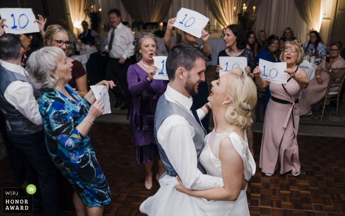 Druids Glen Resort Co Wicklow Ireland wedding reportage photography at the venue: Groom's aunties judge the first dance... 