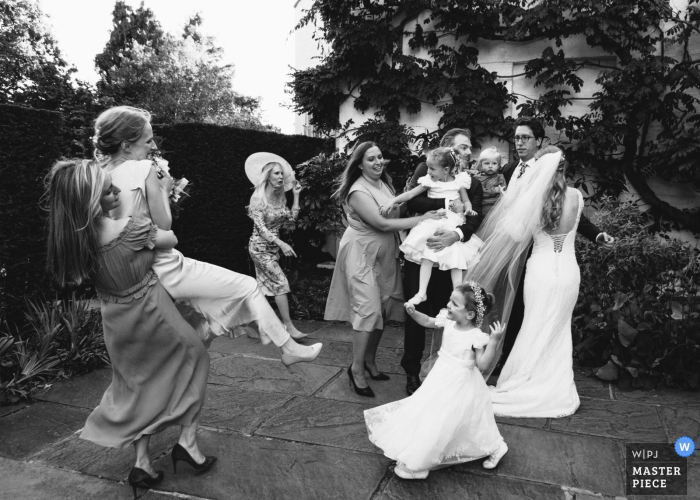Photo by: <a href="https://www.wpja.com/contests/2019-v19/best-wedding-photographers/2570512">Matilda Delves - Canterbury Kent</a> England Reception Chaos of group photos