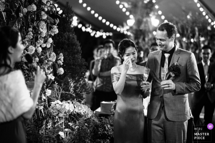 Photo by: <a href="https://www.wpja.com/contests/2019-v19/best-wedding-photographers/2570547">Ronnie Szeto - Tseung Kwan O </a> Bride cries while hearing a touching speech from her best friend and bridesmaid, the groom watched on | Wooden Fairies, Hong Kong wedding