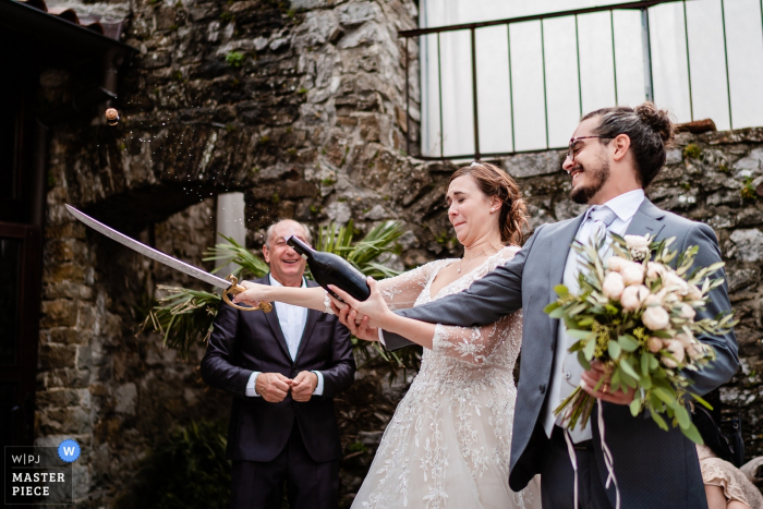 Photo by: <a href="https://www.wpja.com/contests/2019-v19/best-wedding-photographers/2570812">Paolo Blocar - Trieste Trieste</a> Socerb Castle, Slovenja - Saber used to open champagne bottle