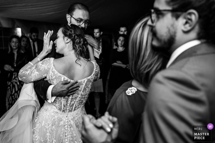 Photo by: <a href="https://www.wpja.com/contests/2019-v19/best-wedding-photographers/2570817">Paolo Blocar - Trieste Trieste</a> Socerb Castle, Slovenja image contains: Dance with parents at the wedding reception.