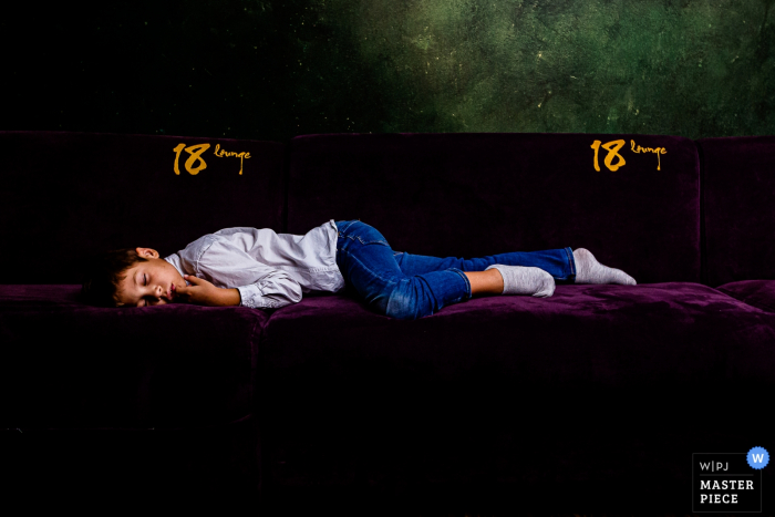 Photo by: <a href="https://www.wpja.com/contests/2019-v19/best-wedding-photographers/2570959">Mihai Zaharia - Bucharest București</a> Romania wedding image from 18 Lounge: The party was just too much for this kid, he had to take a nap
