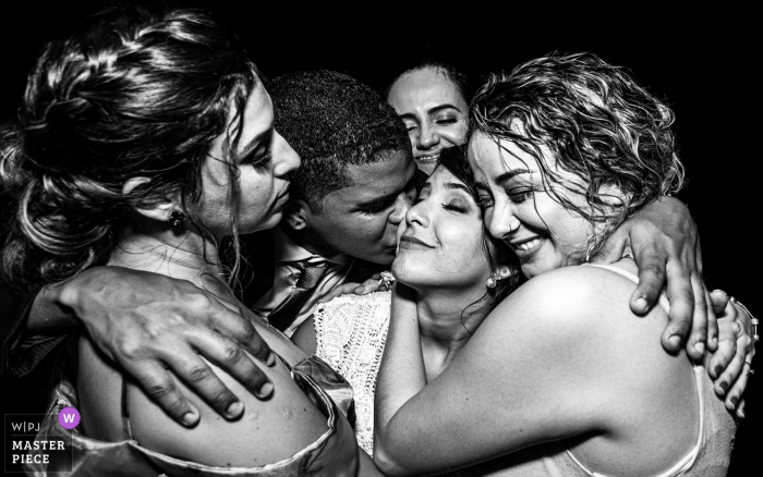 Photo by: <a href="https://www.wpja.com/contests/2019-v19/best-wedding-photographers/2570979">Monica Guimaraes - Maceió Alagoas</a> Brazil Wedding Reception Image Contains: friends demonstrating their love for the bride