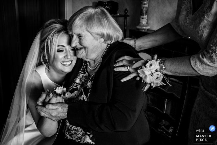 Photo by: <a href="https://www.wpja.com/contests/2019-v19/best-wedding-photographers/2571044">Annie Kheffache - Dun Laoghaire Dublin</a> Tankardstown House, Ireland Bride hugging granny - Wedding Photo