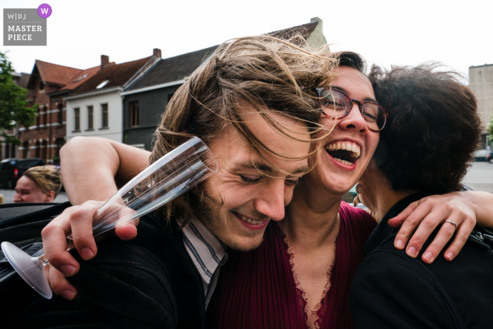 Photo by: <a href="https://www.wpja.com/contests/2019-v19/best-wedding-photographers/2571064">Simon Leclercq - Leuven Vlaams Brabant</a> Flanders Church Temse - Image Contains a Big Family hug