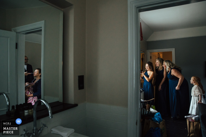 The Olde Bell, Hurley wedding reportage photo of the The bride and bridesmaids getting ready The Olde Bell, Hurley wedding reportage photographer: The bride and bridesmaids getting ready