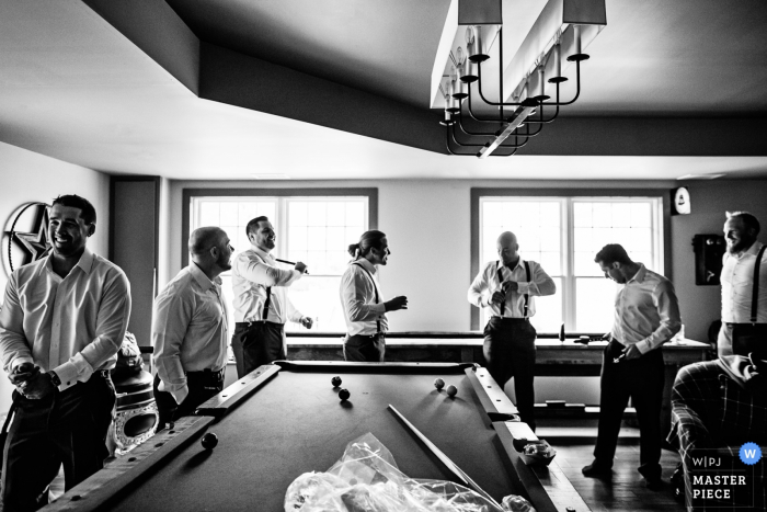 Photo by: <a href="https://www.wpja.com/contests/2019-v19/best-wedding-photographers/2571865">Michelle Arlotta - Milford New Jersey</a> Groomsmen getting ready in Woodford Lounge of Bear Brook Valley - New Jersey wedding photographer
