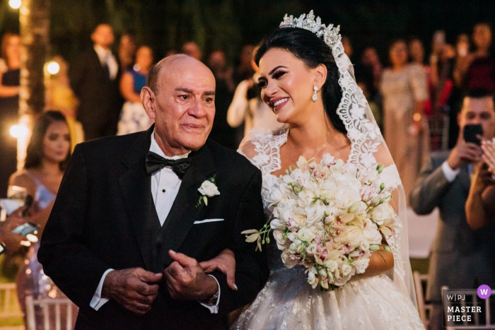 Photo by: <a href="https://www.wpja.com/contests/2019-v19/best-wedding-photographers/2571909">Ruben Parra - Panama City Panama</a> Panama wedding photo from the ceremony | father of the bride taking his girl to the altar