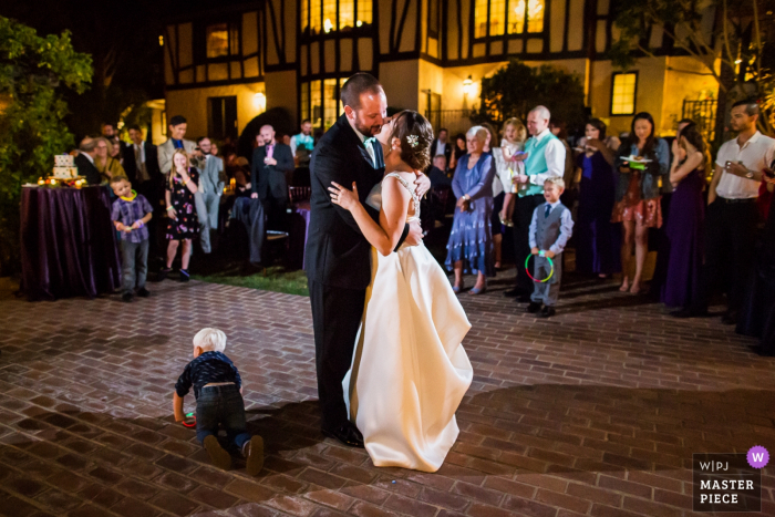 Private residence, Saratoga wedding photographer: Don't mind me and continue with your first dance