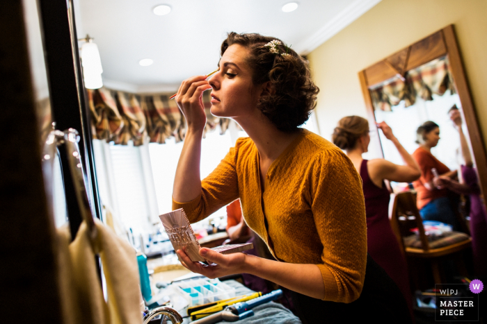 Photo by: <a href="https://www.wpja.com/contests/2019-v20/best-wedding-photographers/2574990">Chris Shum - Sunnyvale California</a> Private residence wedding day photography, Saratoga | Putting on a nice makeup