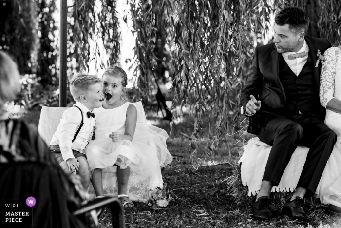 kids were having fun at the outdoor ceremony Netherlands Wedding Ceremony Photographer: The kids were having too much fun at the ceremony and were laughing out loud