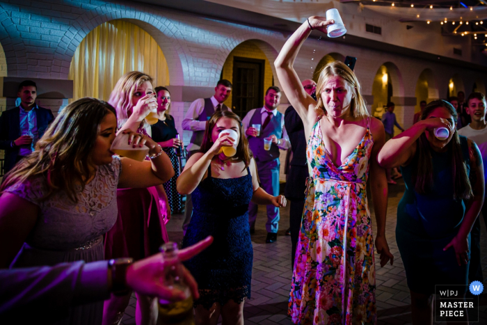 Photo by: <a href="https://www.wpja.com/contests/2019-v20/best-wedding-photographers/2574149">Victoria Sprung - Chicago Illinois</a> Pipers at the Marrott, Indianapolis, IN wedding venue pictures of a beer chug contest