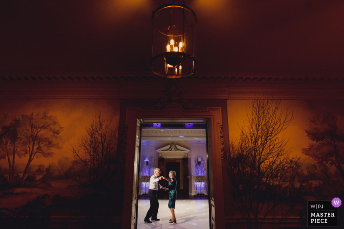 Hedsor House UK wedding reportage photos of an old couple on dance floor alone