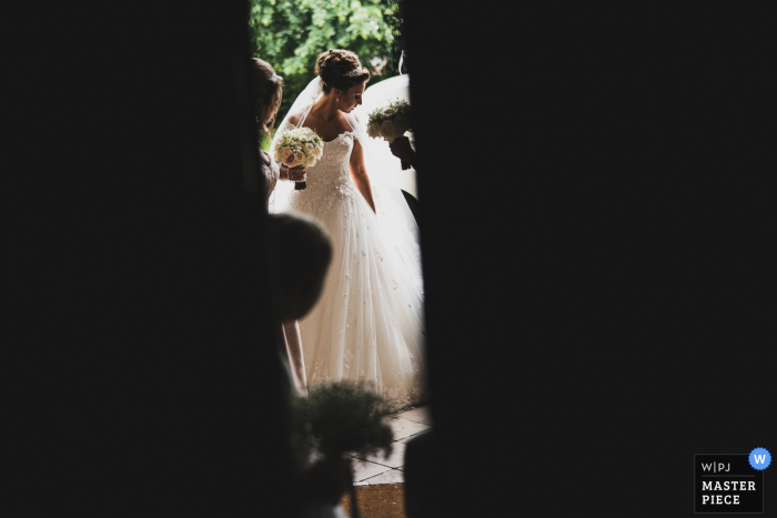 Buckingham Bride die in de kerk aankomt | VK trouwreportage fotografie