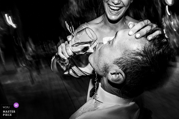 Photo by: <a href="https://www.wpja.com/contests/2019-v20/best-wedding-photographers/2576496">Tunde Koncsol - Budapest</a> Hungary wedding reception photography - Balaton | Guests drink it, party hard