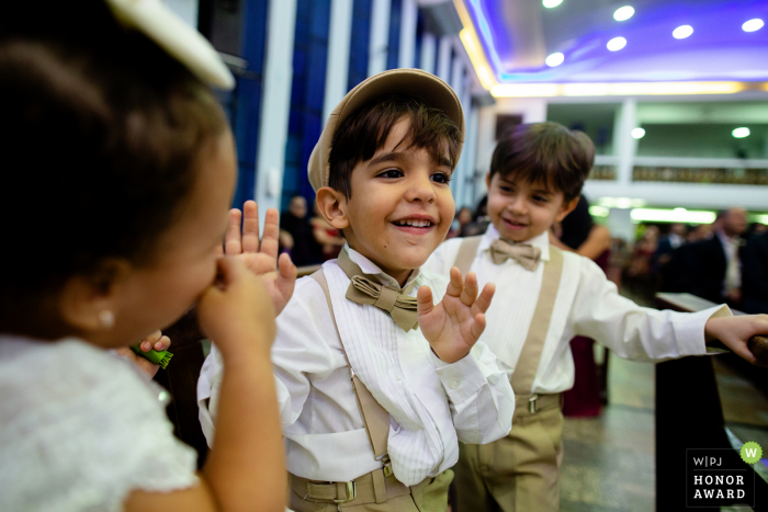 Wedding photo of kids being kids - flowergirl and ring bearer Wedding photo of kids being kids.