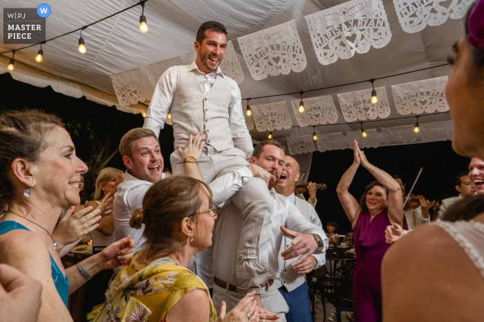 Casa Villa Verde, Puerto Vallarta Wedding Reception image of the bride and groom partaking in the Hora Dance Casa Villa Verde, Puerto Vallarta Wedding Reception image of the bride and groom partaking in the Hora Dance