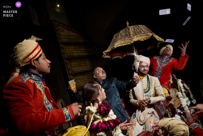 Jaipur, India Wedding Photo showing money Tips to musicians on Baraat procession Jaipur, India Wedding Photo | Tips to musicians on Baraat procession