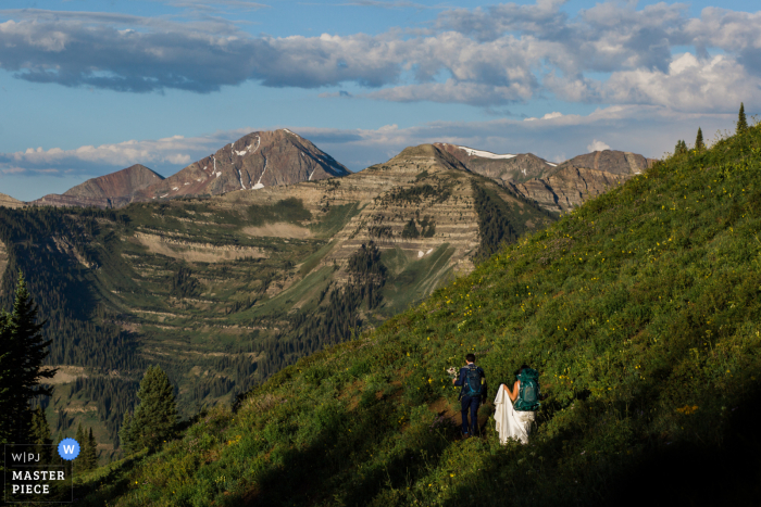 Colorado Outdoor Elopement Photo | Couple hiking towards the ceremony spot 