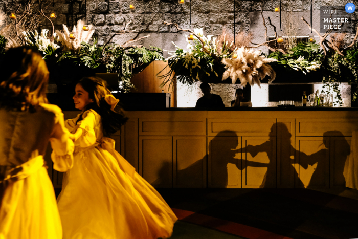 Oaxaca City Wedding Photography showing Flower girls dancing during the reception Oaxaca City Wedding Photographer | Flower girls dancing during the reception
