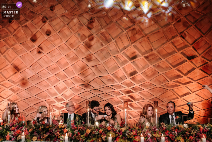 La Fabrica, Oaxaca City Wedding Photography | Cheers after speeches during the wedding reception party 