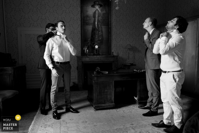 Black and white wedding photo of guys getting ready at Chateau Rocher wedding photo of guys getting ready at Chateau Rocher