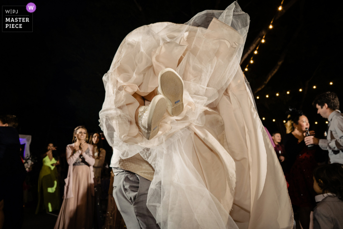 FL wedding photo from the Florida Naples Zoo showing The small details of the brides shoes and dress